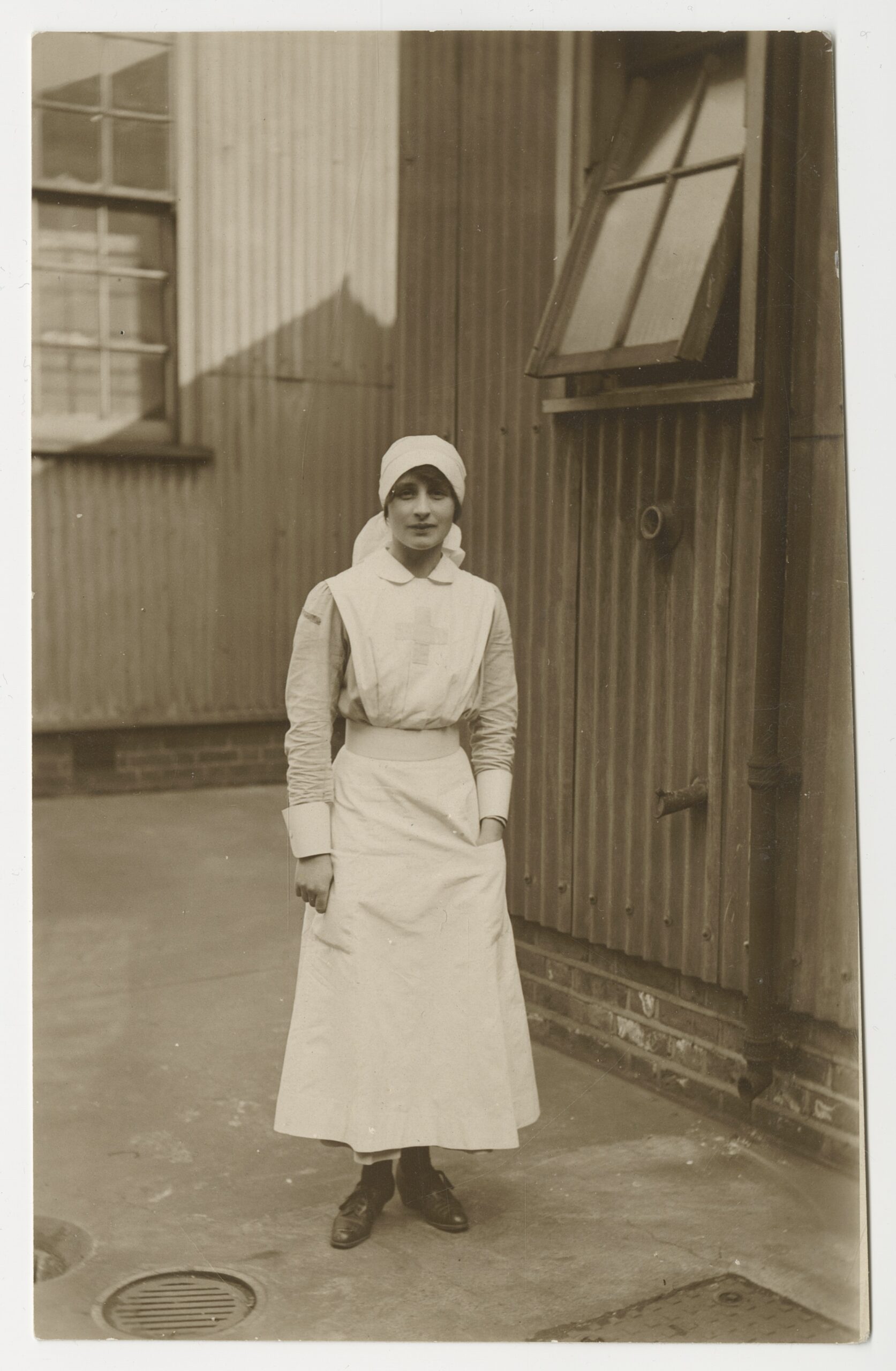 Vera Brittain photographed outside the 1st London General Hospital during WWI. The writer and campaigner served as a VAD. © Photograph of Vera Brittain reproduced by permission of The William Ready Division of Archives and Research Collections, McMaster University Library & the Vera Brittain Estate.